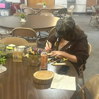 An older Main Street School student concentrating on independent project work