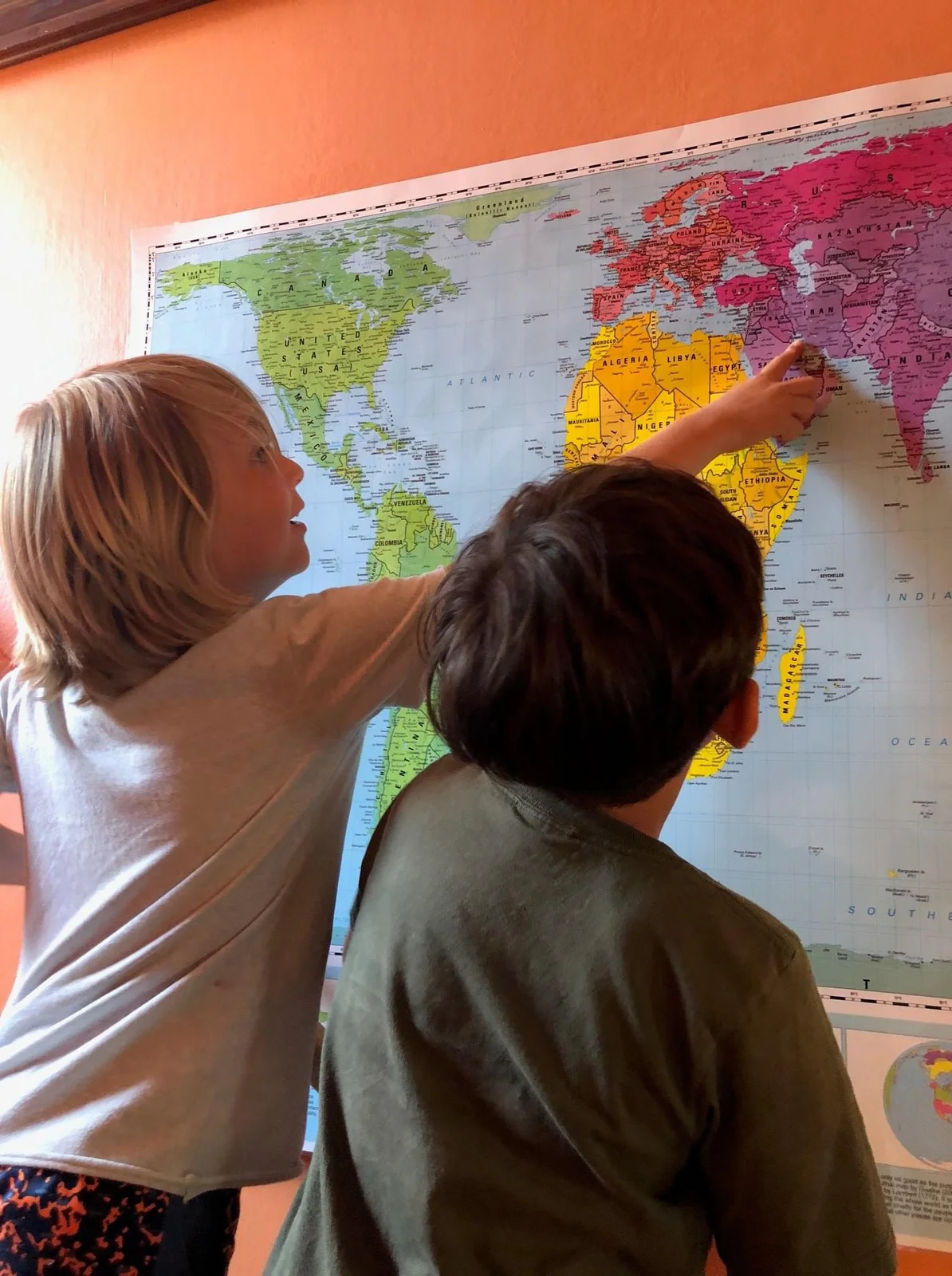 Main Street School middle school students working together with a large classroom map